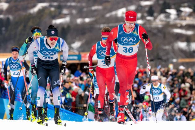OLYMPICS - Winter Olympic Games, Olympische Spiele, Olympia, OS Milano Cortina 2026 TESERO,ITALY,21.FEB.26 - OLYMPICS, NORDIC SKIING, NORDIC COMBINED, CROSS COUNTRY - Winter Olympic Games Milano Cortina 2026, 50km, mass start, classic, men. Image shows Jakob Elias Moch (GER), Beda Klee and Nicola Wigger (SUI).  GEPAxpictures xMatthiasxTrinkl