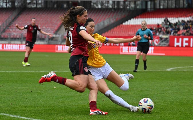 21.02.2026 - Fussball - Saison 2025 2026 - 1. Google Pixel Frauen Bundesliga - 19. Spieltag: 1. FC Nürnberg FCN ( Club Clubfrauen ) - FC Carl Zeiss Jena - Sportfoto Zink - xwoxzix - Laura Miller (9, 1. FC Nürnberg FCN ) Suya Haering (5, FC Carl Zeiss Jena )