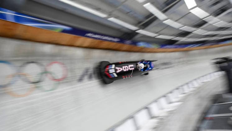 OLYMPICS - Winter Olympic Games, Olympische Spiele, Olympia, OS Milano Cortina 2026 CORTINA D AMPEZZO,ITALY,21.FEB.26 - OLYMPICS, BOBSLEIGH - Winter Olympic Games Milano Cortina 2026, 4-man, heat 1 and 2, men. Image shows Kristopher Horn, Caleb Furnell, Hunter Powell and Carsten Vissering (USA).  GEPAxpictures xAlexanderxSolc