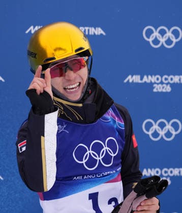 (260221) -- LIVIGNO, Feb. 21, 2026 -- Li Tianma of China reacts during the freestyle skiing mixed team aerials final 1 at the Milan-Cortina 2026 Olympic Winter games, Winterspiele,Spiele, Summer games in Livigno, Italy, Feb. 21, 2026. ) (MICO2026)ITALY-LIVIGNO-OLYMPIC WINTER GAMES-FREESTYLE SKIING-MIXED TEAM AERIALS-FINAL HuxChao 