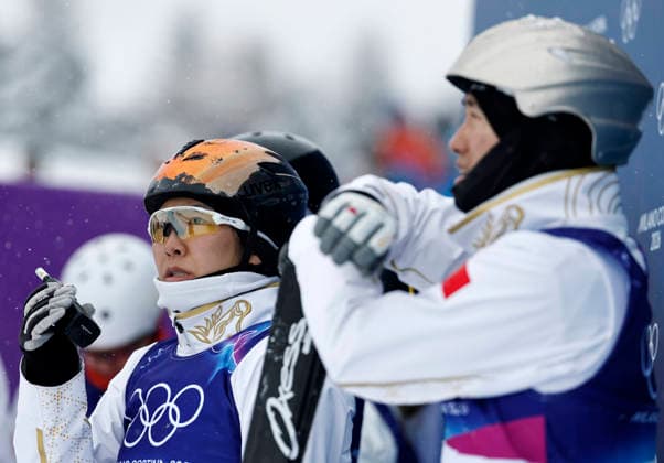 (260221) -- LIVIGNO, Feb. 21, 2026 -- Xu Mengtao of China reacts during the freestyle skiing mixed team aerials final 2 at the Milan-Cortina 2026 Olympic Winter games, Winterspiele,Spiele, Summer games in Livigno, Italy, Feb. 21, 2026. ) (MICO2026)ITALY-LIVIGNO-OLYMPIC WINTER GAMES-FREESTYLE SKIING-MIXED TEAM AERIALS-FINAL WangxPeng 