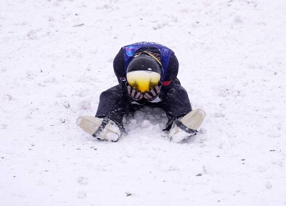 (260221) -- LIVIGNO, Feb. 21, 2026 -- Li Tianma of China reacts during the freestyle skiing mixed team aerials final 2 at the Milan-Cortina 2026 Olympic Winter games, Winterspiele,Spiele, Summer games in Livigno, Italy, Feb. 21, 2026. ) (MICO2026)ITALY-LIVIGNO-OLYMPIC WINTER GAMES-FREESTYLE SKIING-MIXED TEAM AERIALS-FINAL HuxChao 