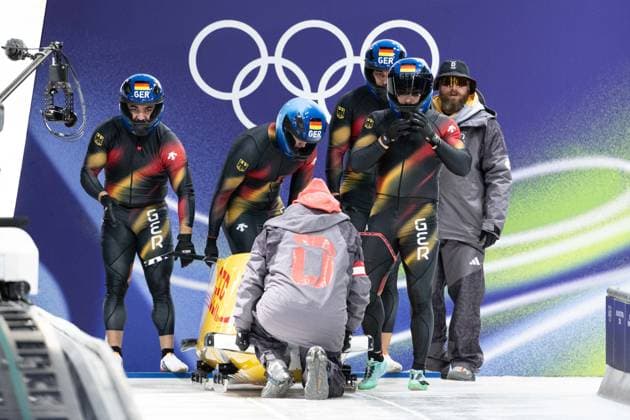 GER – Adam Ammour, Issam Ammour, Joshua Tasche, Alexander Schaller, Viererbob der Männer bei den Olympischen Winterspielen Milano Cortina 2026 im Cortina Sliding Centre, Cortina dAmpezzo, Italien, am 21. Februar 2026. compete in the Mens Four-Man bobsleigh event at the Olympic Winter games, Winterspiele,Spiele, Summer games Milano Cortina 2026 at the Cortina Sliding Centre, Cortina dAmpezzo, Italy, on February 21, 2026. *** GER - Adam Ammour, Issam Ammour, Joshua Tasche, Alexander Schaller, Mens Four Man bobsleigh at the Olympic Winter Games Milano Cortina 2026 at the Cortina Sliding Centre, Cortina dAmpezzo, Italy, on February 21, 2026 compete in the Mens Four Man bobsleigh event at the Olympic Winter Games Milano Cortina 2026 at the Cortina Sliding Centre, Cortina dAmpezzo, Italy, on February 21, 2026 Copyright: HMBxMedia MarcxNiemeyer
