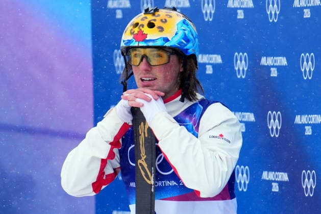 February 21, 2026, Livigno, Italy: Canada s Miha Fontaine waits for his score during the mixed team aerials at the Milano Cortina 2026 Winter Olympic Games, Olympische Spiele, Olympia, OS in Livigno, Italy, Saturday, Feb. 21, 2026. Canada News - February 21, 2026  - ZUMAc35_ 20260221_zaf_c35_027 Copyright: xSeanxKilpatrickx