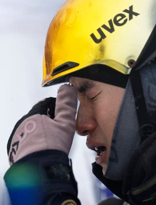(260221) -- LIVIGNO, Feb. 21, 2026 -- Li Tianma of China cries during the freestyle skiing mixed team aerials final 2 at the Milan-Cortina 2026 Olympic Winter games, Winterspiele,Spiele, Summer games in Livigno, Italy, Feb. 21, 2026. ) (MICO2026)ITALY-LIVIGNO-OLYMPIC WINTER GAMES-FREESTYLE SKIING-MIXED TEAM AERIALS-FINAL WangxPeng 