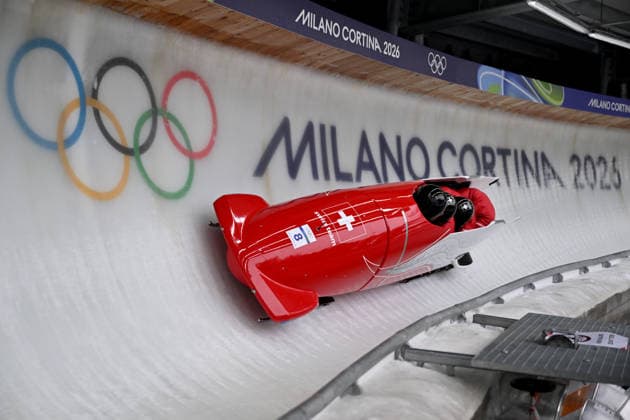 Cortina d Ampezzo, Italy, February 21th 2026. Cedric Follador, Luca Rolli, Tim Annen, Omar Vogele of Switzwerland in action during the Bobsleight 4-man Heat 2 race of the Olympic Winter games, Winterspiele,Spiele, Summer games 2026 in Cortina d Ampezzo, Italy. (Photo by Igor Kupljenik Sports Press Photo)  Copyright: xIgorxKupljenikx xSPPx Sportspressphoto_SPR95521