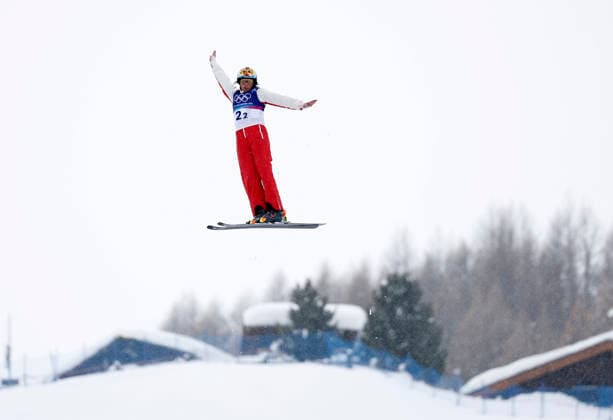 (260221) -- LIVIGNO, Feb. 21, 2026 -- Miha Fontaine of Canada competes during the freestyle skiing mixed team aerials final 1 at the Milan-Cortina 2026 Olympic Winter games, Winterspiele,Spiele, Summer games in Livigno, Italy, Feb. 21, 2026. ) (MICO2026)ITALY-LIVIGNO-OLYMPIC WINTER GAMES-FREESTYLE SKIING-MIXED TEAM AERIALS-FINAL WangxPeng 
