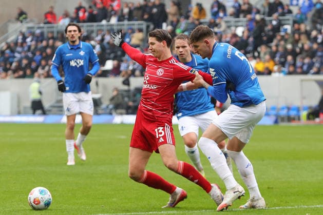 21.02.2026, xtvx, Fussball 2.Bundesliga, SV Darmstadt 98 - Fortuna Duesseldorf v.l. Zweikampf, Duell, duel, tackle, compete Cedric Itten (Fortuna Duesseldorf) Matej Maglica (SV Darmstadt 98) (DFL DFB REGULATIONS PROHIBIT ANY USE OF PHOTOGRAPHS as IMAGE SEQUENCES and or QUASI-VIDEO) Darmstadt