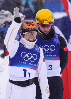 (260221) -- LIVIGNO, Feb. 21, 2026 -- Xu Mengtao and Li Tianma (R) of China react after the freestyle skiing mixed team aerials final 2 at the Milan-Cortina 2026 Olympic Winter games, Winterspiele,Spiele, Summer games in Livigno, Italy, Feb. 21, 2026. ) (MICO2026)ITALY-LIVIGNO-OLYMPIC WINTER GAMES-FREESTYLE SKIING-MIXED TEAM AERIALS-FINAL HuxChao 
