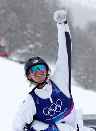 (260221) -- LIVIGNO, Feb. 21, 2026 -- Connor Curran of the United States celebrates during the freestyle skiing mixed team aerials final 2 at the Milan-Cortina 2026 Olympic Winter games, Winterspiele,Spiele, Summer games in Livigno, Italy, Feb. 21, 2026. ) (MICO2026)ITALY-LIVIGNO-OLYMPIC WINTER GAMES-FREESTYLE SKIING-MIXED TEAM AERIALS-FINAL WangxPeng 