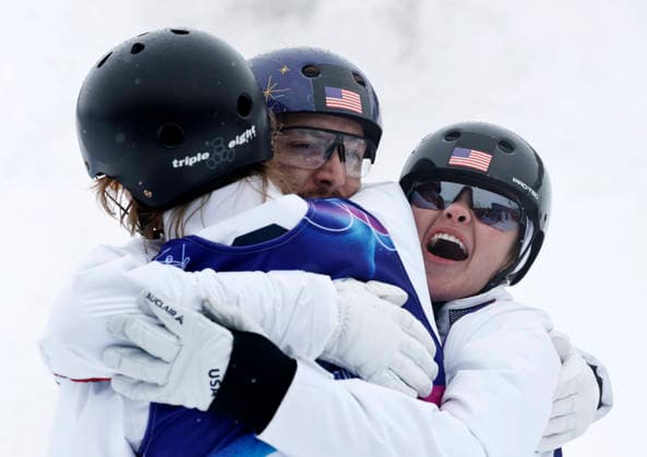 (260221) -- LIVIGNO, Feb. 21, 2026 -- Christopher Lillis (C), Connor Curran (L) and Kaila Kuhn of the United States celebrate after the freestyle skiing mixed team aerials final 2 at the Milan-Cortina 2026 Olympic Winter games, Winterspiele,Spiele, Summer games in Livigno, Italy, Feb. 21, 2026. ) (MICO2026)ITALY-LIVIGNO-OLYMPIC WINTER GAMES-FREESTYLE SKIING-MIXED TEAM AERIALS-FINAL WangxPeng 