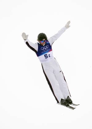 (260221) -- LIVIGNO, Feb. 21, 2026 -- Connor Curran of the United States competes during the freestyle skiing mixed team aerials final 1 at the Milan-Cortina 2026 Olympic Winter games, Winterspiele,Spiele, Summer games in Livigno, Italy, Feb. 21, 2026. ) (MICO2026)ITALY-LIVIGNO-OLYMPIC WINTER GAMES-FREESTYLE SKIING-MIXED TEAM AERIALS-FINAL HuxChao 