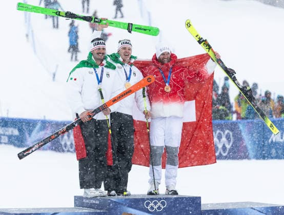 OLYMPICS - Winter Olympic Games, Olympische Spiele, Olympia, OS Milano Cortina 2026 LIVIGNO,ITALY,21.FEB.26 - OLYMPICS, FREE SKI, FREESTYLE SKIING - Winter Olympic Games Milano Cortina 2026, Skicross, men, final, medal ceremony. Image shows Federico Tomasoni (ITA), Simone Deromedis (ITA) and Alex Fiva (SUI). Keywords: medal.  GEPAxpictures xWolfgangxGrebien