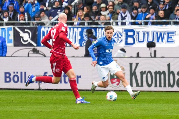 2. Bundesliga: SV Darmstadt 98 vs Fortuna Düsseldorf, Merck-Stadion am Böllenfalltor, 21.02.2026 Zweikampf zwischen Valgeir Lunddal Friðriksson (Fortuna Düsseldorf, 12) und am Ball Luca Marseiler (SV Darmstadt 98, 8) 2. Bundesliga: SV Darmstadt 98 vs Fortuna Düsseldorf, Merck-Stadion am Böllenfalltor, 21.02.2026 DFB DFL REGULATIONS PROHIBIT ANY USE OF PHOTOGRAPHS AS IMAGE SEQUENCES AND OR QUASI-VIDEO.