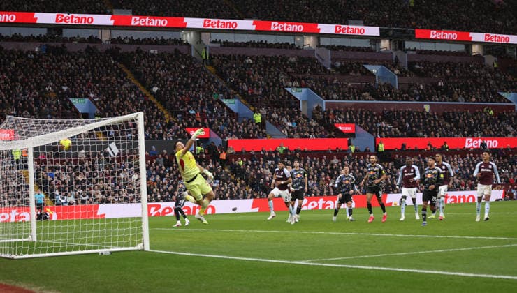 Emiliano Martinez (AV) cannot save the free-kick from Anton Stach (LU) as he scored the first Leeds goal (0-1) at the Aston Villa v Leeds United EPL match, at Villa Park, Birmingham, UK on 21st February, 2026. 