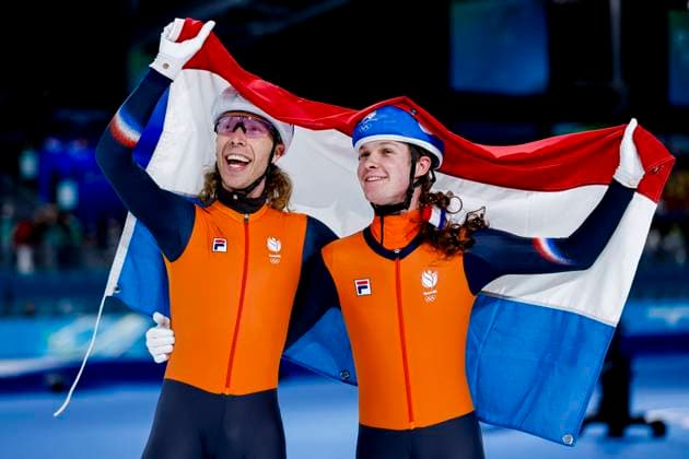 winner Jorrit Bergsma of the Netherlands and Stijn Van De Bunt of the Netherlands celebrating and holding flag after Men s Mass Start Final, Milano Cortina 2026 Winter Olympics: Day 15, Speed skating, Eisschnelllauf - Milano Cortina 2026 Winter Olympics: Day 15, Milano Speed Skating Stadium, February 21, 2026, Milan, Italy.