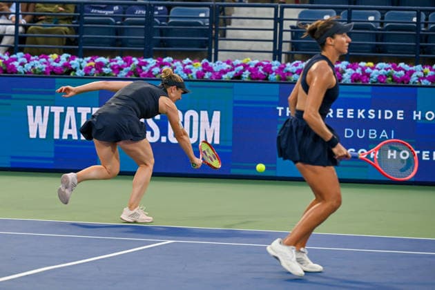 2026 Dubai Duty Free Tennis Championships DUBAI, UAE - FEBRUARY 21: German tennis player Laura Siegemund (not seen) and Russian tennis player Vera Zvonareva (not seen) compete against Canadian tennis player Gabriela Dabrowski (L) and Brazilian tennis player Luisa Stefani (R) in the women’s doubles final of the Dubai Duty Free Tennis Championships at the Dubai Duty Free Tennis Stadium in Dubai, United Arab Emirates, on February 21, 2026. Waleed Zein Anadolu Dubai United Arab Emirates. Editorial use only. Please get in touch for any other usage.  Copyright: x2026xAnadoluxWaleedxZeinx