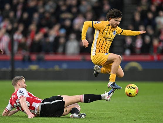 21st February 2026; Gtech Community Stadium, Brentford, London, England; Premier League Football, Brentford versus Brighton and Hove Albion; Kristoffer Ajer of Brentford tackles Ferdi Kadioglu of Brighton  SimonxWest Content restricted for UK based newspaper