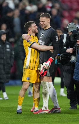 Brentford v Brighton and Hove Albion, Premier League, Football, Gtech Community Stadium, Brentford, London, UK - 21 Feb 2026 Bart Verbruggen of Brighton celebrates with James Milner of Brighton after he sets the Premier League appearance record after his 654th appearance. London Gtech Community Stadium Brentford UK, UK NEWSPAPERS OUT Copyright: xSeanxRyanx