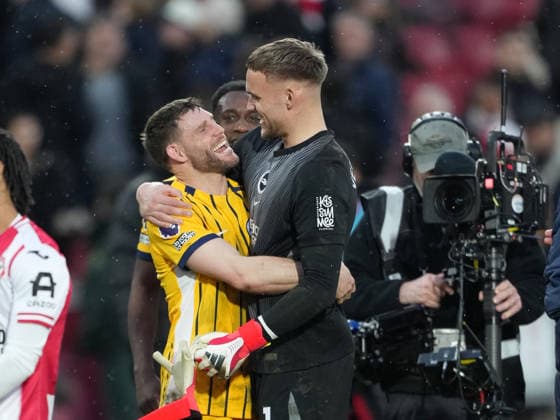 Brentford v Brighton and Hove Albion, Premier League, Football, Gtech Community Stadium, Brentford, London, UK - 21 Feb 2026 Bart Verbruggen of Brighton celebrates with James Milner of Brighton after he sets the Premier League appearance record after his 654th appearance. London Gtech Community Stadium Brentford UK, UK NEWSPAPERS OUT Copyright: xSeanxRyanx