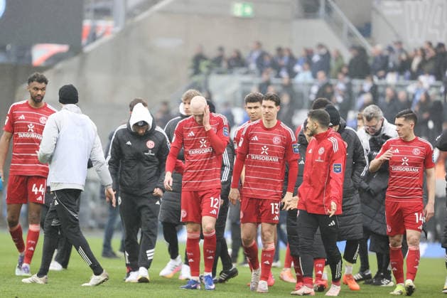 21.02.2026, xtvx, Fussball 2.Bundesliga, SV Darmstadt 98 - Fortuna Duesseldorf v.l. Valgeir Lunddal (Fortuna Duesseldorf) Cedric Itten (Fortuna Duesseldorf) nach dem Spiel, after the match enttaeuscht, enttaeuscht schauend, dissapointed (DFL DFB REGULATIONS PROHIBIT ANY USE OF PHOTOGRAPHS as IMAGE SEQUENCES and or QUASI-VIDEO) Darmstadt