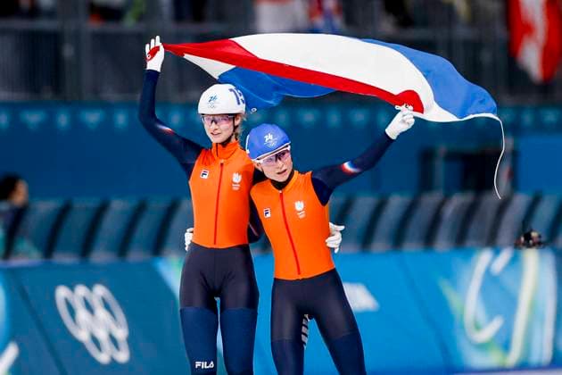 winner Marijke Groenewoud of the Netherlands and Bente Kerkhoff of the Netherlands celebrating and holding flag after Women s Mass Start Final, Milano Cortina 2026 Winter Olympics: Day 15, Speed skating, Eisschnelllauf - Milano Cortina 2026 Winter Olympics: Day 15, Milano Speed Skating Stadium, February 21, 2026, Milan, Italy.