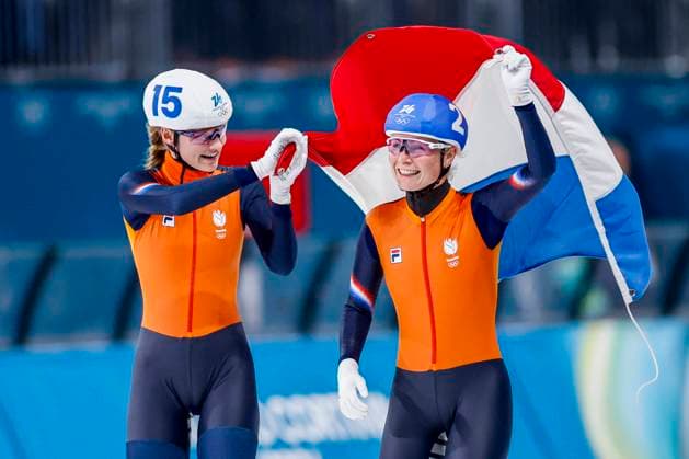 winner Marijke Groenewoud of the Netherlands and Bente Kerkhoff of the Netherlands celebrating and holding flag after Women s Mass Start Final, Milano Cortina 2026 Winter Olympics: Day 15, Speed skating, Eisschnelllauf - Milano Cortina 2026 Winter Olympics: Day 15, Milano Speed Skating Stadium, February 21, 2026, Milan, Italy.