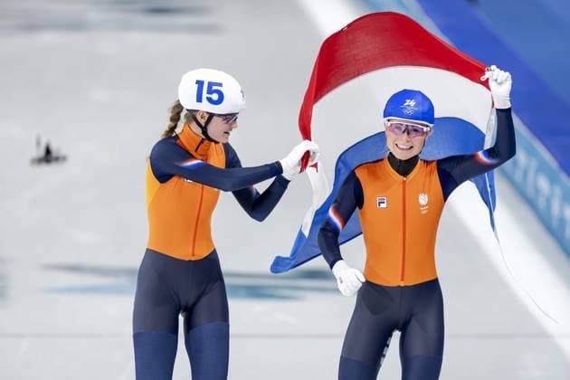 MILAN (l-r) Benthe Kerkhoff and Marijke Groenewoud celebrate Marijke Groenewoud s gold medal after winning the mass start final at the Milan Ice Park during the Winter Olympics in Milan and Cortina d Ampezzo. ROBIN VAN LONKHUIJSEN ANP xVIxANPxSportx xxANPxIVx 551382015 originalFilename: 551382015.jpg