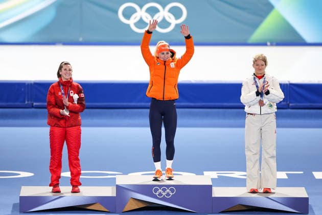 ITALY, MILAN - FEBRUARY 21, 2026: Silver medalist Ivanie Blondin of Canada, gold medalist Marijke Groenewoud of the Netherlands, and bronze medalist Mia Manganello (L-R) of the United States pose during a victory ceremony for the women s mass start Speed skating, Eisschnelllauf race at Milano Speed Skating Stadium during the 2026 Winter Olympic Games, Olympische Spiele, Olympia, OS Peter Kovalev TASS  89047406