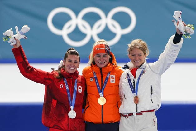 ITALY, MILAN - FEBRUARY 21, 2026: Silver medalist Ivanie Blondin of Canada, gold medalist Marijke Groenewoud of the Netherlands, and bronze medalist Mia Manganello (L-R) of the United States pose during a victory ceremony for the women s mass start Speed skating, Eisschnelllauf race at Milano Speed Skating Stadium during the 2026 Winter Olympic Games, Olympische Spiele, Olympia, OS Peter Kovalev TASS  89047409