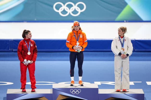 ITALY, MILAN - FEBRUARY 21, 2026: Silver medalist Ivanie Blondin of Canada, gold medalist Marijke Groenewoud of the Netherlands, and bronze medalist Mia Manganello (L-R) of the United States pose during a victory ceremony for the women s mass start Speed skating, Eisschnelllauf race at Milano Speed Skating Stadium during the 2026 Winter Olympic Games, Olympische Spiele, Olympia, OS Peter Kovalev TASS  89048275