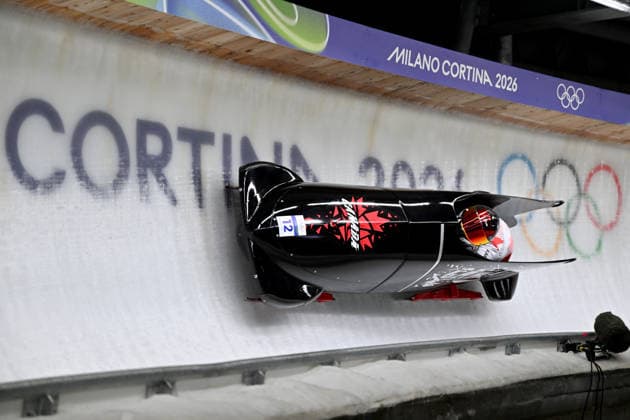 Cortina d Ampezzo, Italy, February 21th 2026. Bianca Ribi and Skylar Sieben of Canada in action during the Bobsleight 2-woman Heat 3 and 4 race of the Olympic Winter games, Winterspiele,Spiele, Summer games 2026 in Cortina d Ampezzo, Italy. (Photo by Igor Kupljenik Sports Press Photo)  Copyright: xIgorxKupljenikx xSPPx Sportspressphoto_SPR95640