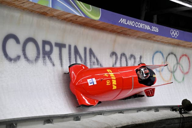 Cortina d Ampezzo, Italy, February 21th 2026. Mingming Huai and Xuan Wang -Chn Kitajska- in action during the Bobsleight 2-woman Heat 3 and 4 race of the Olympic Winter games, Winterspiele,Spiele, Summer games 2026 in Cortina d Ampezzo, Italy. (Photo by Igor Kupljenik Sports Press Photo)  Copyright: xIgorxKupljenikx xSPPx Sportspressphoto_SPR95643