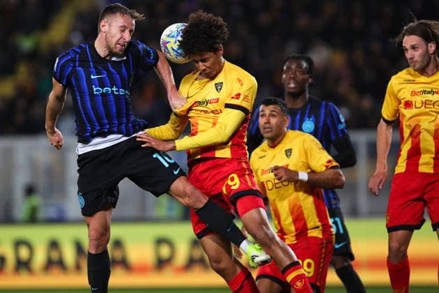 Davide Frattesi of FC Internazionale Milano and Oumar Ngom of US Lecce compete for the ball during the serie A match between US Lecce and FC Internazionale Milano at Ettore Giardiniero - Via del Mare stadium in Lecce (Italy), February 21, 2026. massimilianoxcarnabuci