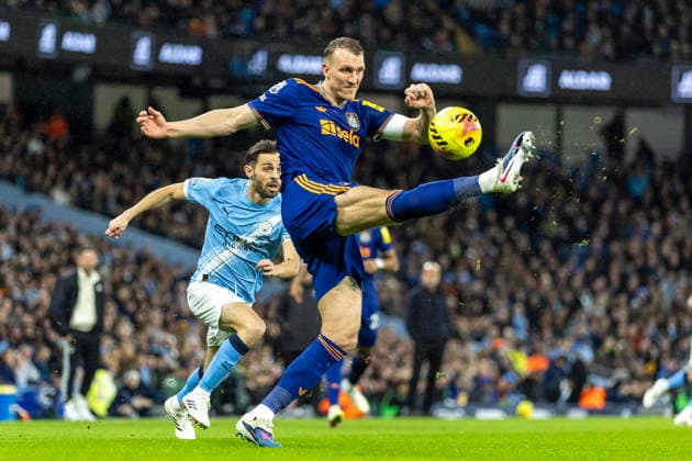 21st February 2026; Etihad Stadium, Manchester, Lancashire, England; Premier League Football, Manchester City versus Newcastle United; Dan Burn of Newcastle United clears the ball  TimxWilliams Content restricted for UK based newspaper