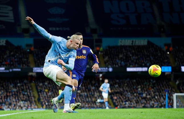 Manchester, England, 21st February 2026. Erling Haaland of Manchester City crosses the ball during the Manchester City vs Newcastle United Premier League match at the Etihad Stadium, Manchester. Picture credit should read: Cody Froggatt Sportimage EDITORIAL USE ONLY. No use with unauthorised audio, video, data, fixture lists, club league logos or live services. Online in-match use limited to 120 images, no video emulation. No use in betting, games or single club league player publications. SPI_034_CF_Man_City_Newc SPI-4542-0034