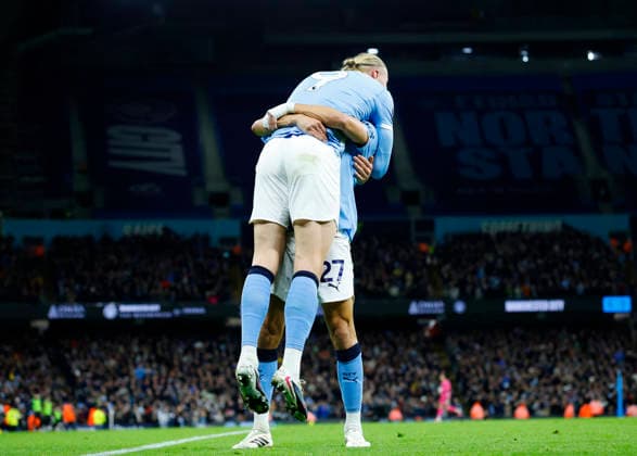 Manchester, England, 21st February 2026. Erling Haaland of Manchester City is lifter up by Matheus Nunes of Manchester City as they celebrate the second goal during the Manchester City vs Newcastle United Premier League match at the Etihad Stadium, Manchester. Picture credit should read: Cody Froggatt Sportimage EDITORIAL USE ONLY. No use with unauthorised audio, video, data, fixture lists, club league logos or live services. Online in-match use limited to 120 images, no video emulation. No use in betting, games or single club league player publications. SPI_035_CF_Man_City_Newc SPI-4542-0036