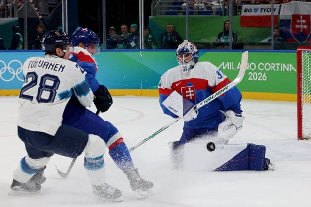 February 21, 2026, Milan, Lombardy, Italy: Samuel Hlavaj (31) of Team Slovakia blocks shot by Team Finland in the men s Ice hockey, Eishockey bronze medal game during the Milano Cortina 2026 Olympic Winter games, Winterspiele,Spiele, Summer games at Milano Santagiulia Ice Hockey Arena. Olympics 2026: Milano Cortina: Ice Hockey-Men Finals - Bronze Medal Game-SVK V FIN  - ZUMAm117 20260221_oly_m117_012 Copyright: xDavidxMcIntyrex