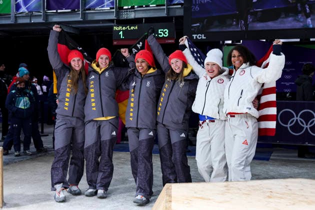 OLYMPICS - Winter Olympic Games, Olympische Spiele, Olympia, OS Milano Cortina 2026 CORTINA D AMPEZZO,ITALY,21.FEB.26 - OLYMPICS, BOBSLEIGH - Winter Olympic Games Milano Cortina 2026, 2-woman, heat 3 and 4. Image shows the rejoicing of Lisa Buckwitz, Neele Schuten, Levi Deborah, Laura Nolte (GER), Kaillie Armbruster Humphries and Jasmine Jones (USA).  GEPAxpictures xMaticxKlansek