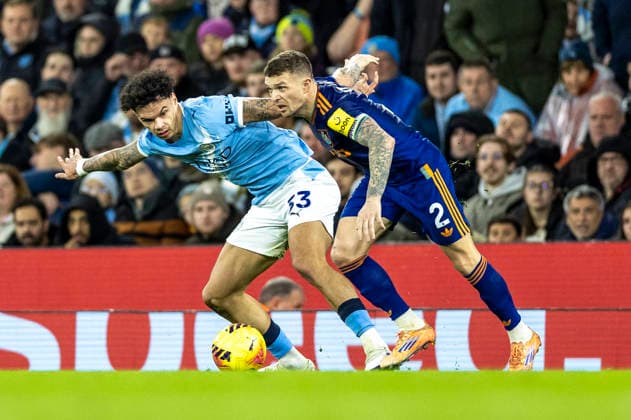 21st February 2026; Etihad Stadium, Manchester, Lancashire, England; Premier League Football, Manchester City versus Newcastle United; Kieran Trippier of Newcastle United under pressure from Nico O Reilly of Manchester City  TimxWilliams Content restricted for UK based newspaper