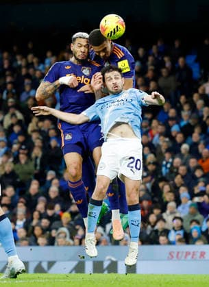 Manchester, England, 21st February 2026. Bernardo Silva of Manchester City puts off Joelinton and Malick Thiaw of Newcastle United during the Manchester City vs Newcastle United Premier League match at the Etihad Stadium, Manchester. Picture credit should read: Cody Froggatt Sportimage EDITORIAL USE ONLY. No use with unauthorised audio, video, data, fixture lists, club league logos or live services. Online in-match use limited to 120 images, no video emulation. No use in betting, games or single club league player publications. SPI_066_CF_Man_City_Newc SPI-4542-0066