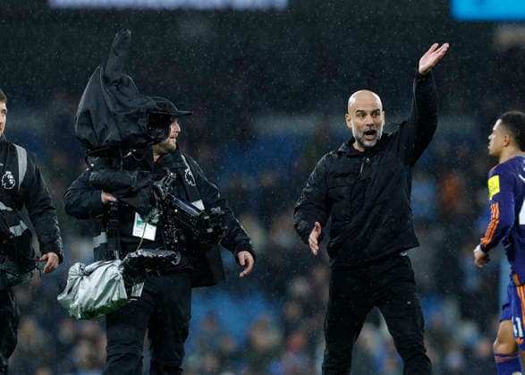 Manchester, England, 21st February 2026. Pep Guardiola coach of Manchester City argues with steadicam at the end of the game during the Manchester City vs Newcastle United Premier League match at the Etihad Stadium, Manchester. Picture credit should read: Cody Froggatt Sportimage EDITORIAL USE ONLY. No use with unauthorised audio, video, data, fixture lists, club league logos or live services. Online in-match use limited to 120 images, no video emulation. No use in betting, games or single club league player publications. SPI_079_CF_Man_City_Newc SPI-4542-0079