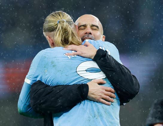 Manchester, England, 21st February 2026. Pep Guardiola coach of Manchester City hugs Erling Haaland of Manchester City during the Manchester City vs Newcastle United Premier League match at the Etihad Stadium, Manchester. Picture credit should read: Cody Froggatt Sportimage EDITORIAL USE ONLY. No use with unauthorised audio, video, data, fixture lists, club league logos or live services. Online in-match use limited to 120 images, no video emulation. No use in betting, games or single club league player publications. SPI_093_CF_Man_City_Newc SPI-4542-0093