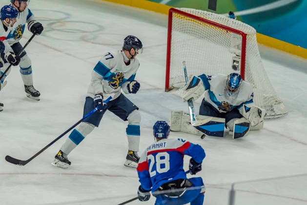 February 21, 2026, Milan, Lombardy, Italy: Goalkeeper Juuse Saros 74 of Team Finland defends the goal while playing against Team Slovakia in the Mens Team Slovakia Vs Team Finland Bronze Medal Game game at the Milano Santagiulia Ice hockey, Eishockey Arena in MILAN, Italy during the 2026 Milano Cortina Winter Olympics. Milan Italy - ZUMAa161 20260221_oly_a161_029 Copyright: xWalterxG.xArcex