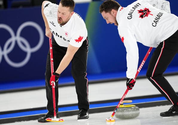 260221 -- CORTINA D AMPEZZO, Feb. 21, 2026 -- Ben Hebert L and Brett Gallant of Canada compete during the curling men s gold medal game between Canada and Britain at the 2026 Milan-Cortina Winter Olympics in Cortina, Italy, Feb. 21, 2026. MICO2026ITALY-CORTINA D AMPEZZO-OLYMPIC Winter games, Winterspiele,Spiele, Summer games CURLING-MEN-GOLD MEDAL GAME-CAN VS GBR LixGang  (MICO2026)ITALY-CORTINA D AMPEZZO-OLYMPIC WINTER GAMES-CURLING-MEN-GOLD MEDAL GAME-CAN VS GBR IMAGO LixGang  imago images 0848250661