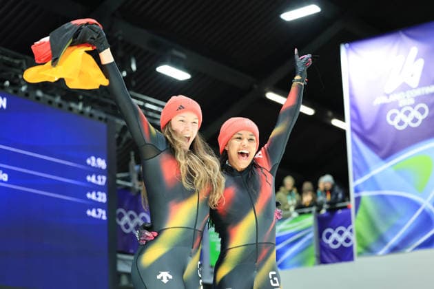 (260222) -- CORTINA D AMPEZZO, Feb. 22, 2026 -- Laura Nolte (L) Deborah Levi of Germany celebrate after winning the Bobsleigh 2-woman at the 2026 Milan-Cortina Winter Olympics in Cortina, Italy, Feb. 21, 2026. ) (MICO2026)ITALY-CORTINA D AMPEZZO-OLYMPIC Winter games, Winterspiele,Spiele, Summer games BOBSLEIGH-2-WOMAN DingxXu 