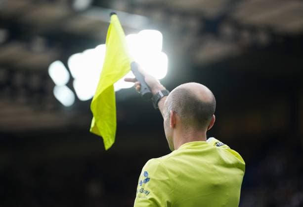 The linesman holds up his flag Chelsea v Burnley, Premier League, Football, Stamford Bridge, London, UK - 21 Feb 2026London Stamford Bridge United Kingdom EDITORIAL USE ONLY No use with unauthorised audio, video, data, fixture lists, club league logos or live services. Online in-match use limited to 120 images, no video emulation. No use in betting, games or single club league player publications. Copyright: xJedxLeicester Shutterstockx 16681483bc