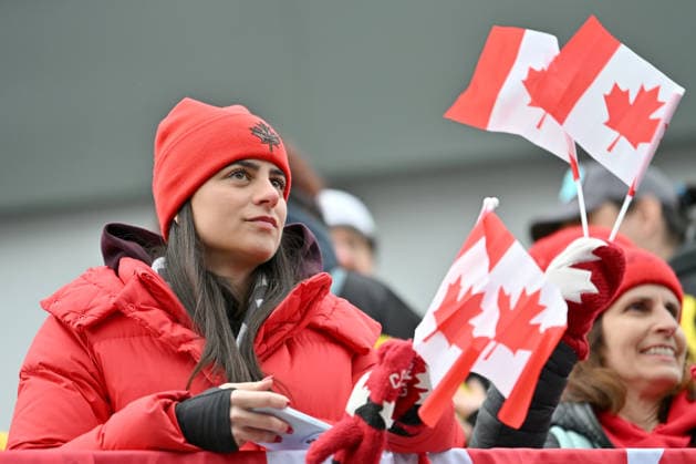 Cortina d Ampezzo, Italy, February 22th 2026. Canada fans during the Bobsleight 4-man Heat 3 race of the Olympic Winter games, Winterspiele,Spiele, Summer games 2026 in Cortina d Ampezzo, Italy. (Photo by Igor Kupljenik Sports Press Photo)  Copyright: xIgorxKupljenikx xSPPx Sportspressphoto_SPR96121
