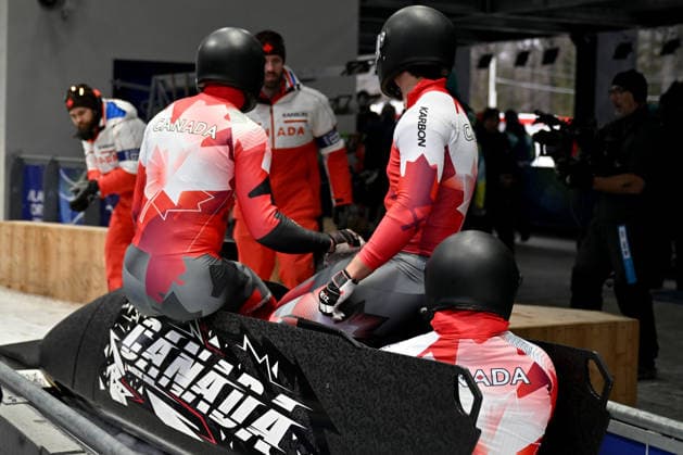 Cortina d Ampezzo, Italy, February 22th 2026. Taylor Austin, Keaton Bruggeling, Mike Evelyn, Shaquille Murray-Lawrence of Canada in action during the Bobsleight 4-man Heat 3 race of the Olympic Winter games, Winterspiele,Spiele, Summer games 2026 in Cortina d Ampezzo, Italy. (Photo by Igor Kupljenik Sports Press Photo)  Copyright: xIgorxKupljenikx xSPPx Sportspressphoto_SPR96134