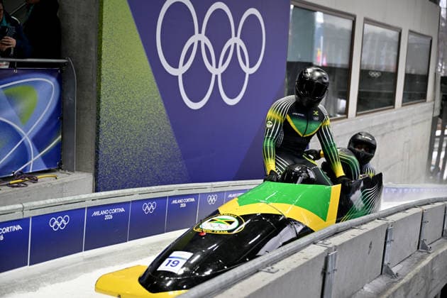 Cortina d Ampezzo, Italy, February 22th 2026. Shane Pitter, Junior Harris, Tyquendo Tracey, Joel Fearon of Jamaica in action during the Bobsleight 4-man Heat 3 race of the Olympic Winter games, Winterspiele,Spiele, Summer games 2026 in Cortina d Ampezzo, Italy. (Photo by Igor Kupljenik Sports Press Photo)  Copyright: xIgorxKupljenikx xSPPx Sportspressphoto_SPR96139